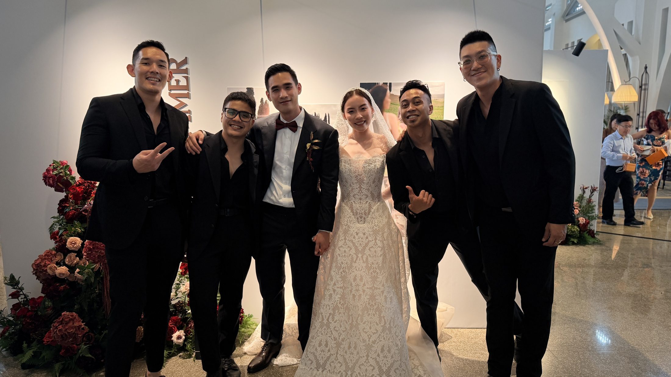 The Jukuleles wedding band with a bride and groom at a Singapore wedding