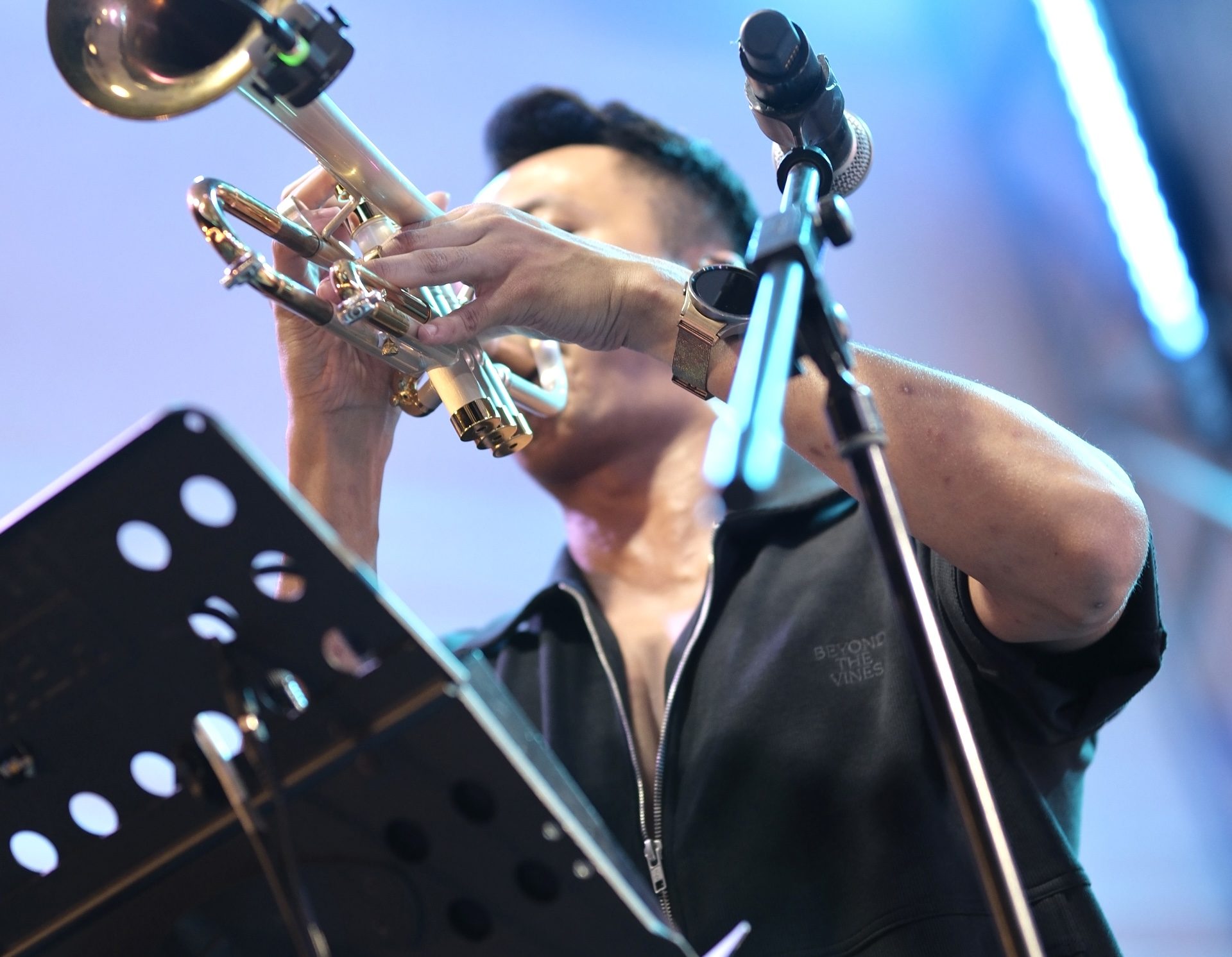 Farhan of The Jukuleles on trumpet at a Singapore music festival